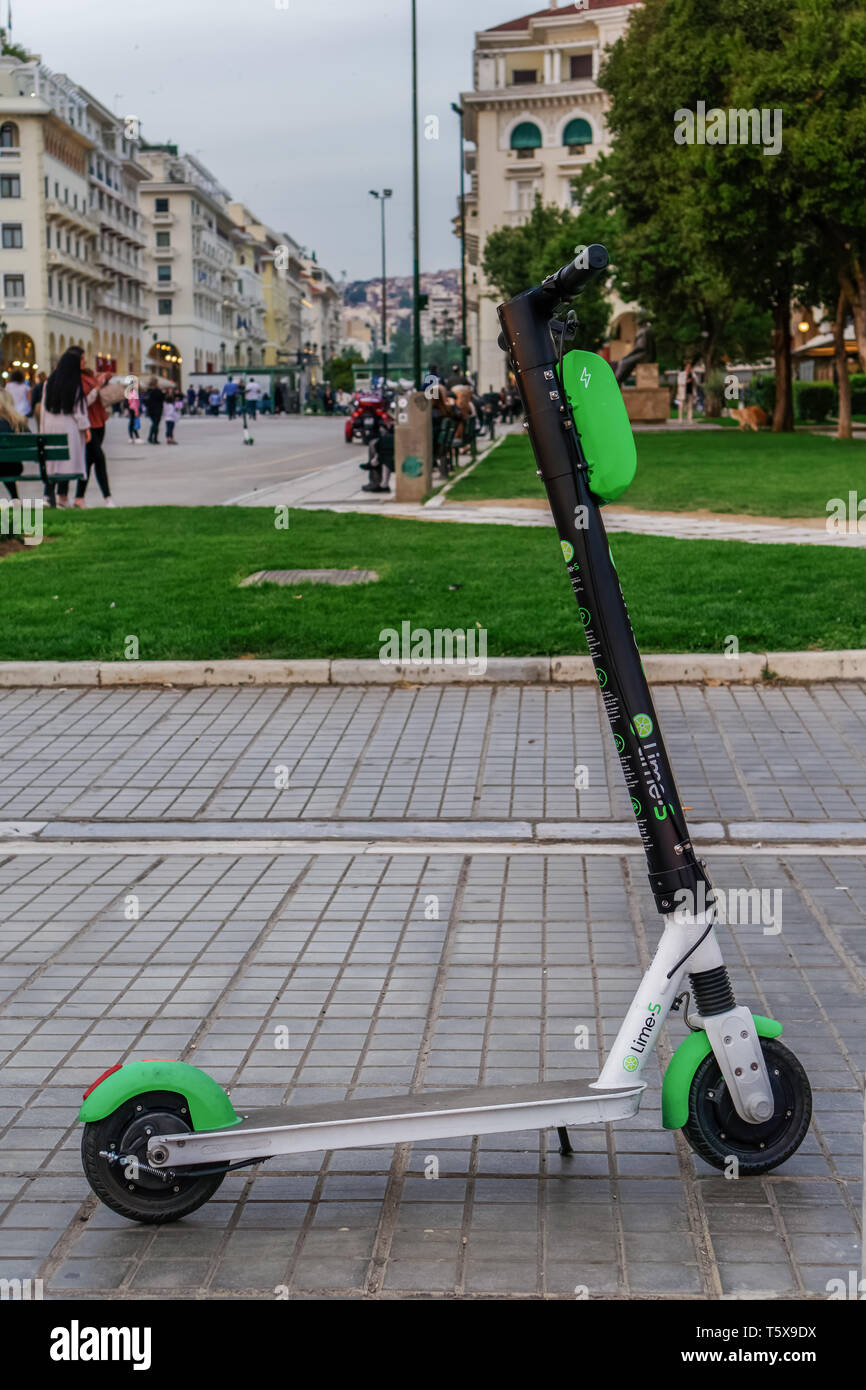 Parked green & black ride sharing Lime-S electric Scooter rental without  passenger, ready to be used by the next rider at Thessaloniki, Greece Stock  Photo - Alamy