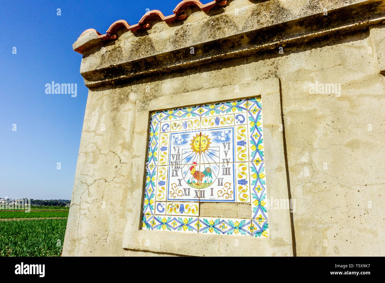 Sundial on the wall of a farmhouse, Ceramic Azulejos, Valencia region, Spain Europe Stock Photo