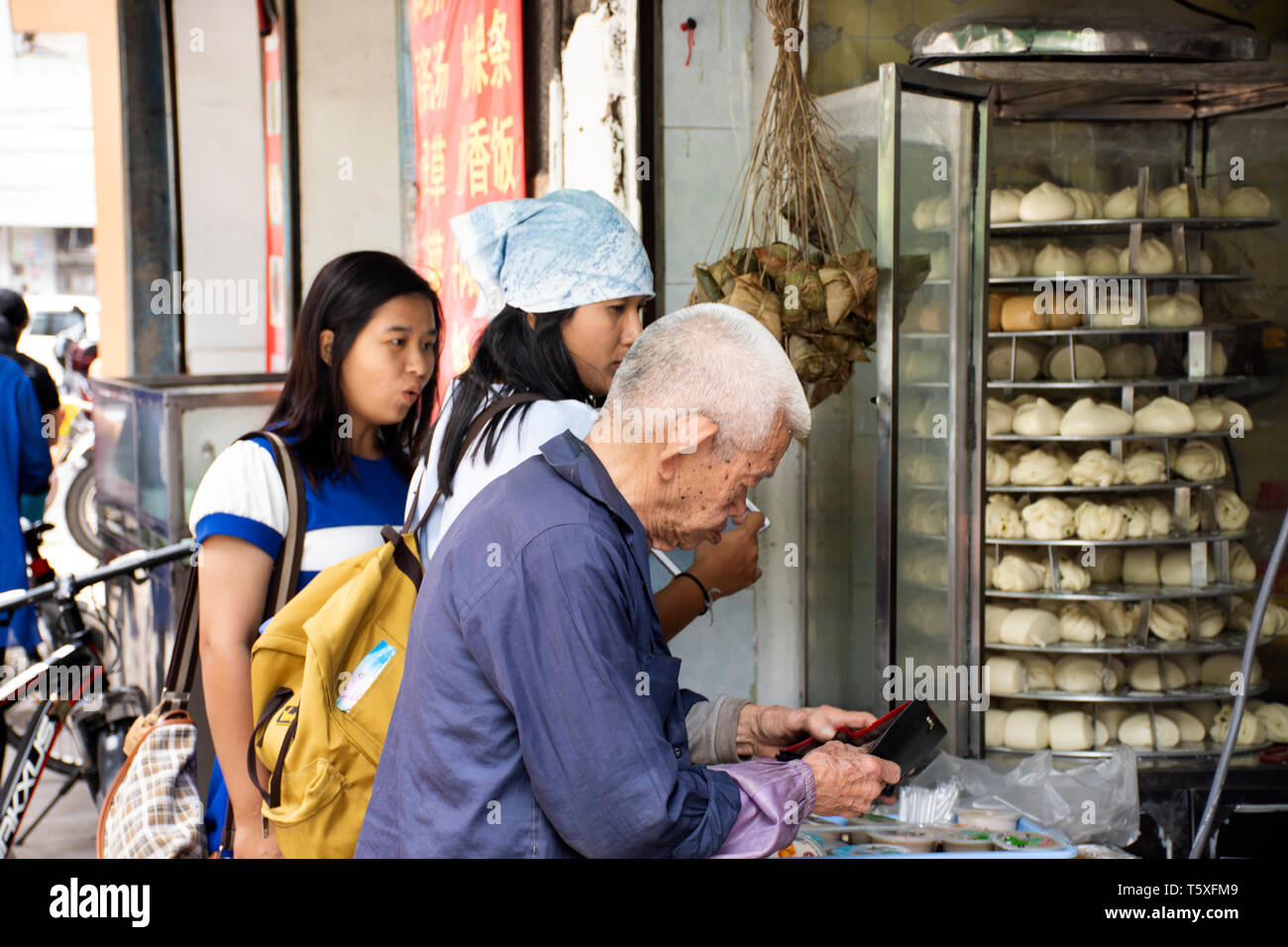 Asian chinese people sale food sticky rice dumpling and tim sum for people buy at local shop in old town at Shantou or Swatow city on May 9, 2018 in G Stock Photo