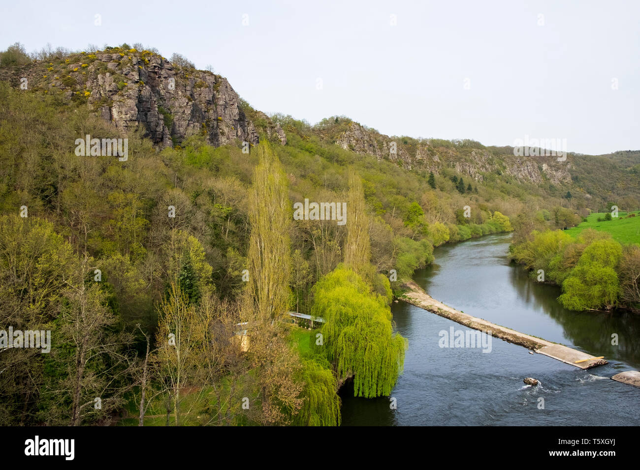The River Orne at Clecy and the rocky outcrops of Rochers de Parcs, Suisse Normande, Normandy Stock Photo
