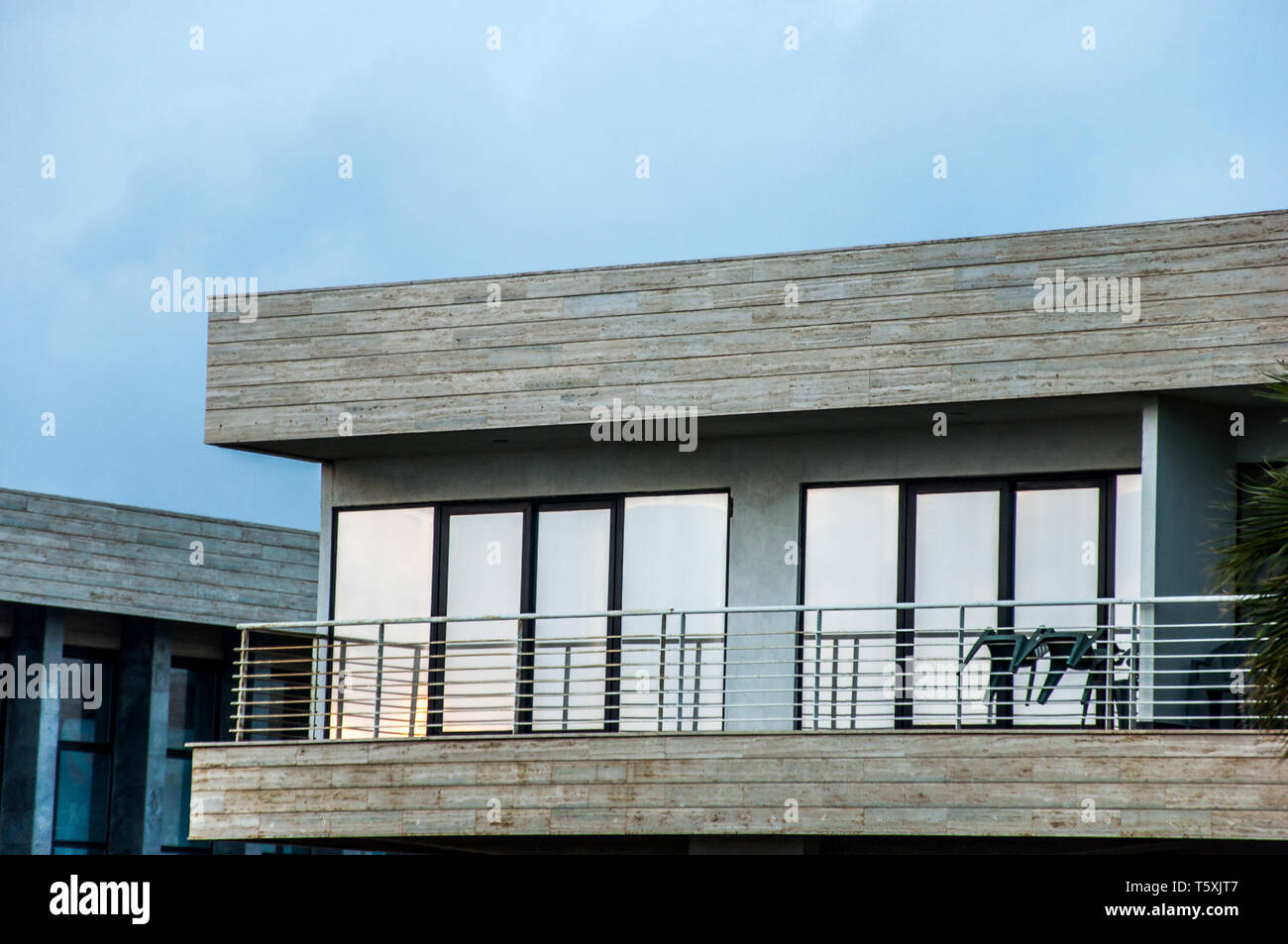 Buildings at sunset with sea view, modern architecture Stock Photo - Alamy
