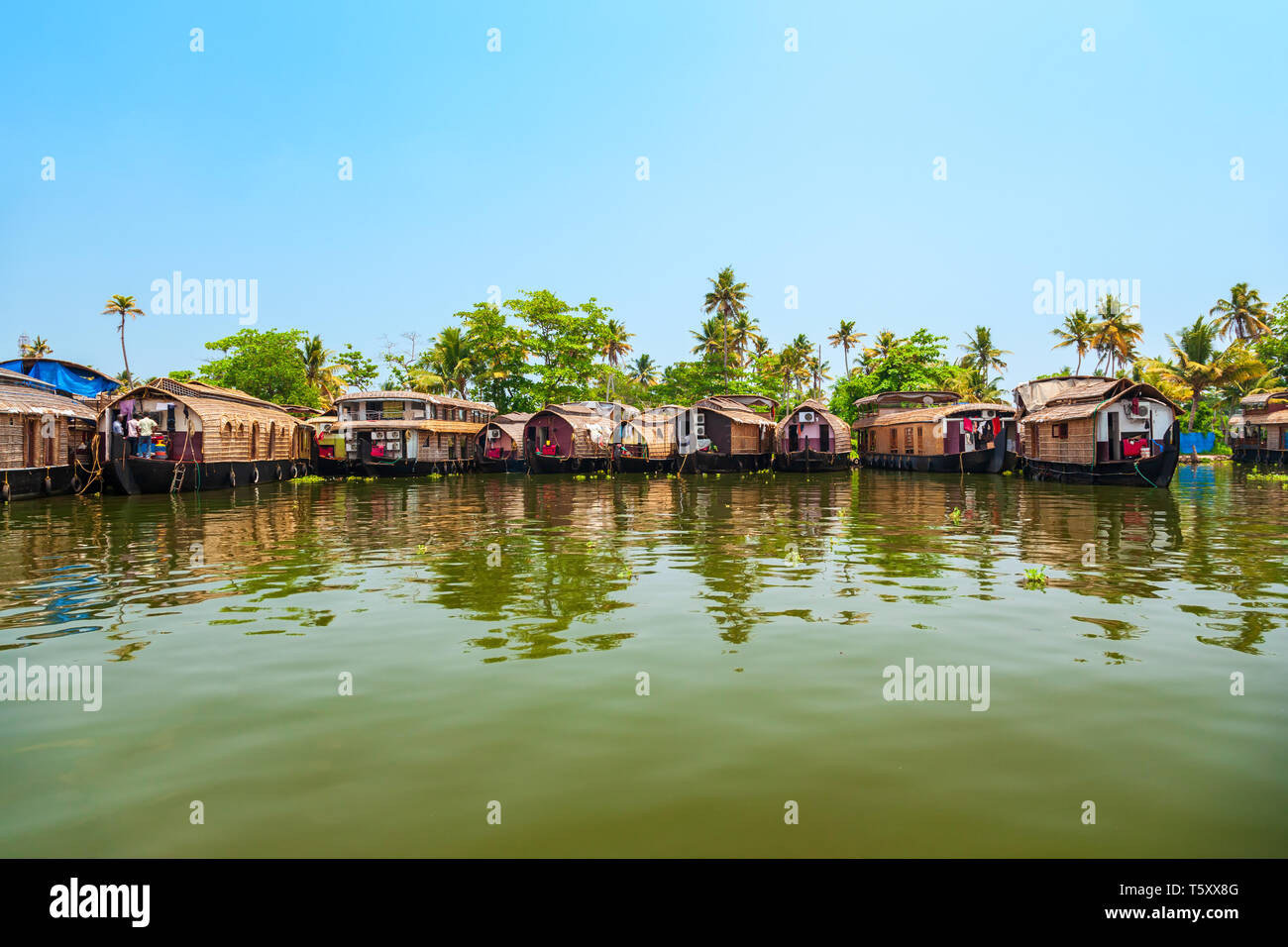 A houseboat sailing in Alappuzha backwaters in Kerala state in India Stock Photo