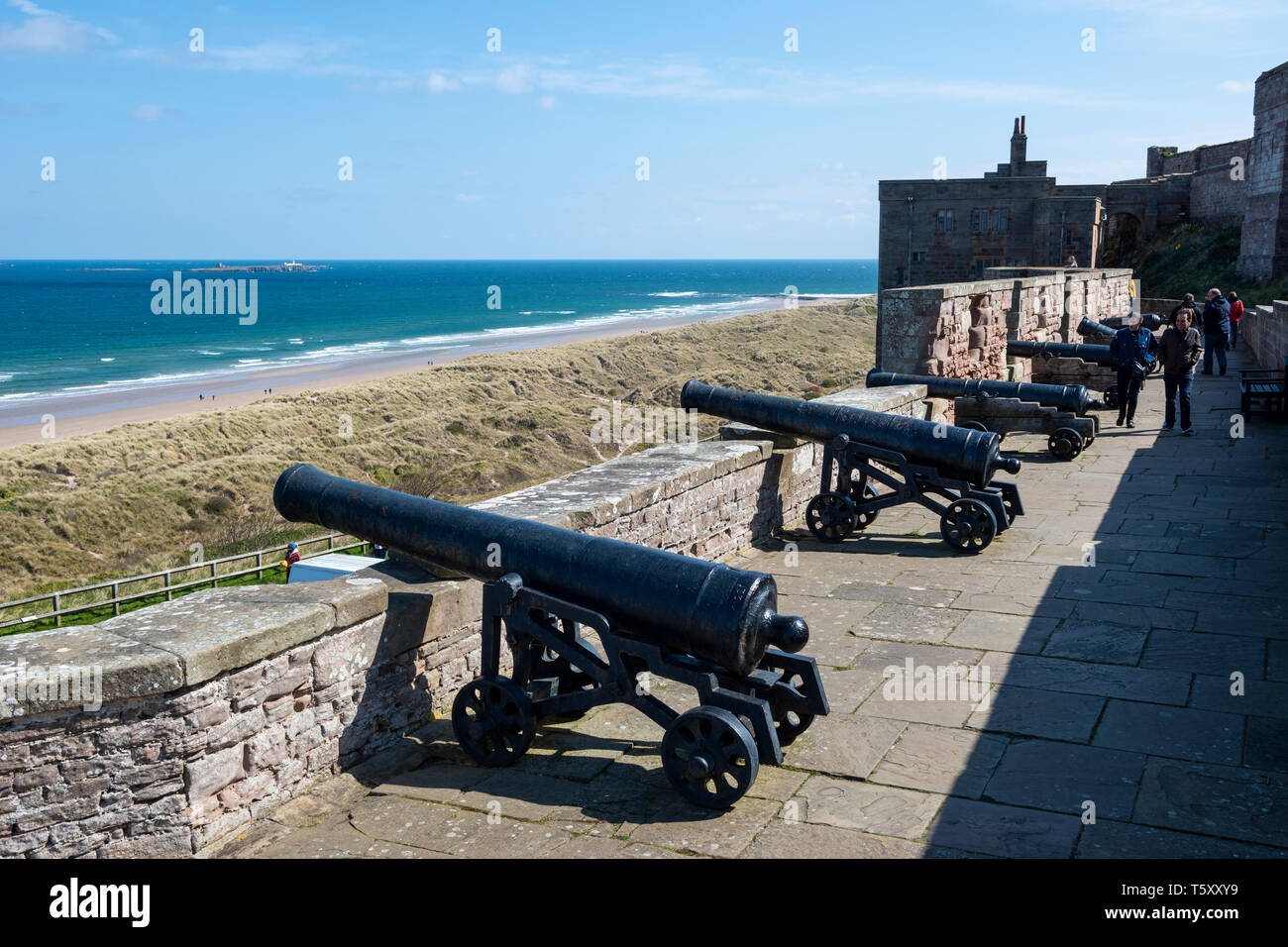 Canons on Battery Terrace at Bamburgh Castle, Northumberland, England, UK Stock Photo