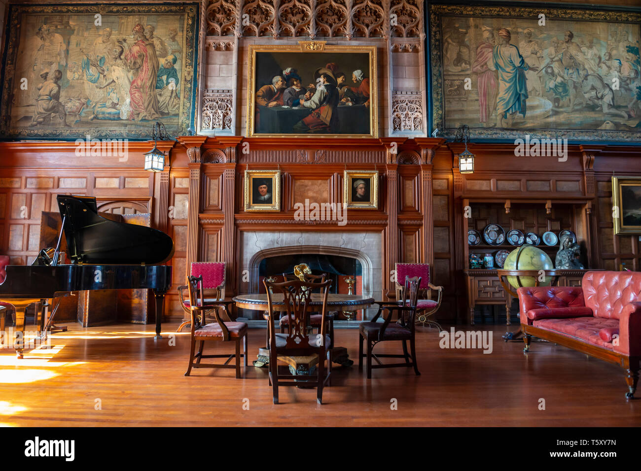 The Cross Hall, part of the State Rooms, at Bamburgh Castle, Northumberland, England, UK Stock Photo