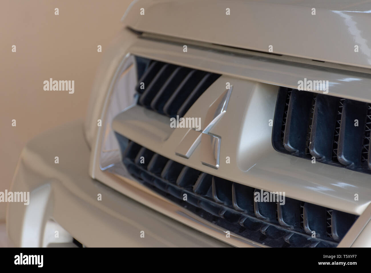 Northern Emirate Rak Uae 3 30 19 A Mitsubishi Pajero Interior Shot Of Black Steering Wheel And Logo 19 A Beige Mitsubishi Pajero Front G Stock Photo Alamy