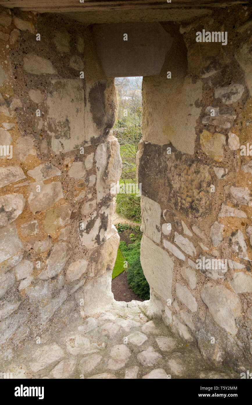 Arrow slit / arrow loop / arrow hole / in the defensive Shell Keep walls of Farnham castle, Castle Hill, Farnham.Surrey, England. UK (108) Stock Photo