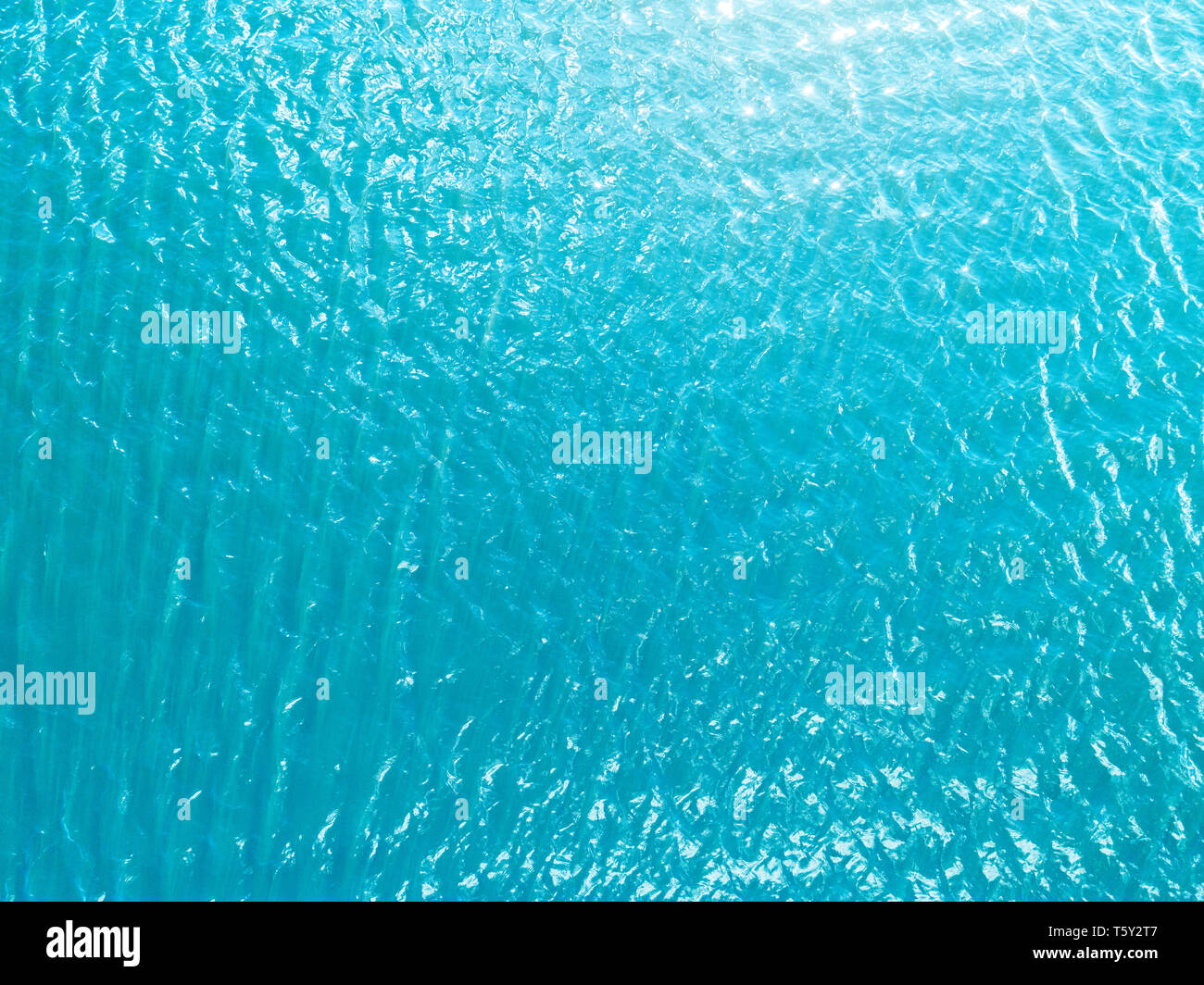 Aerial view of a Crystal clear sea water texture. View from above ...