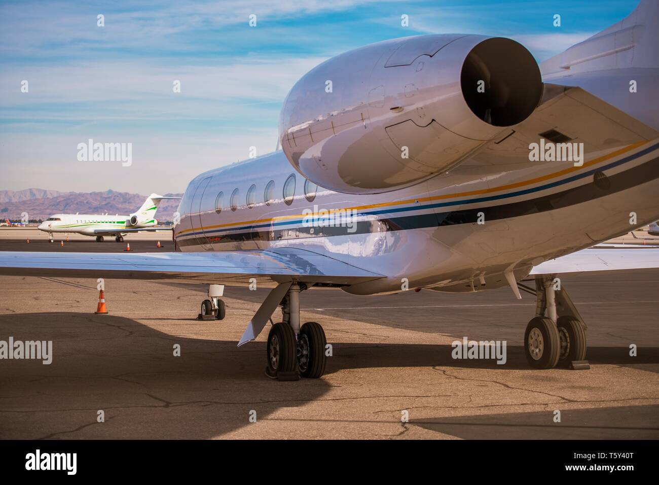 Air Charter Jet Airplane. Airport Area. Modern Air Transportation Theme. Stock Photo