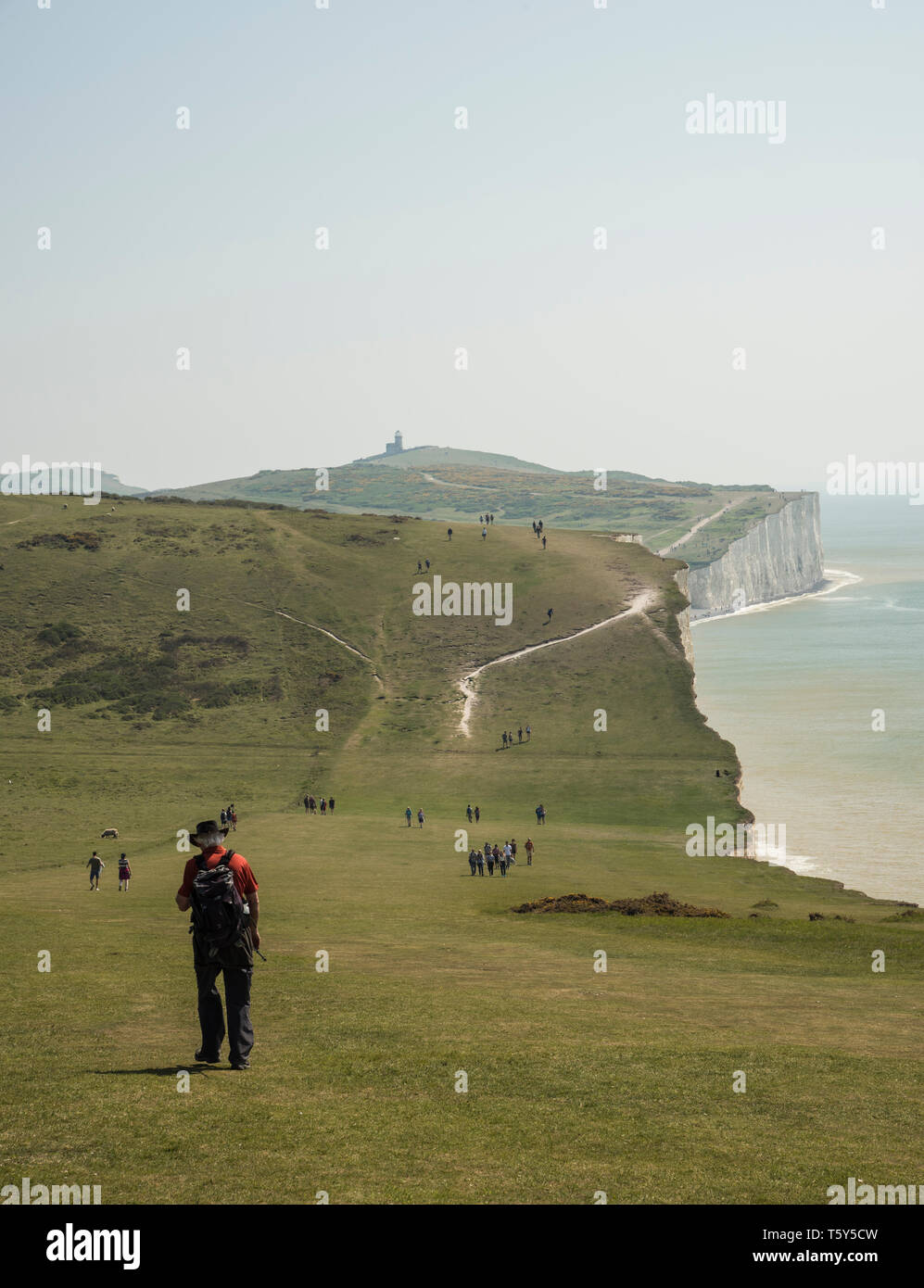 People out walking on the popular footpath on the south downs way ...