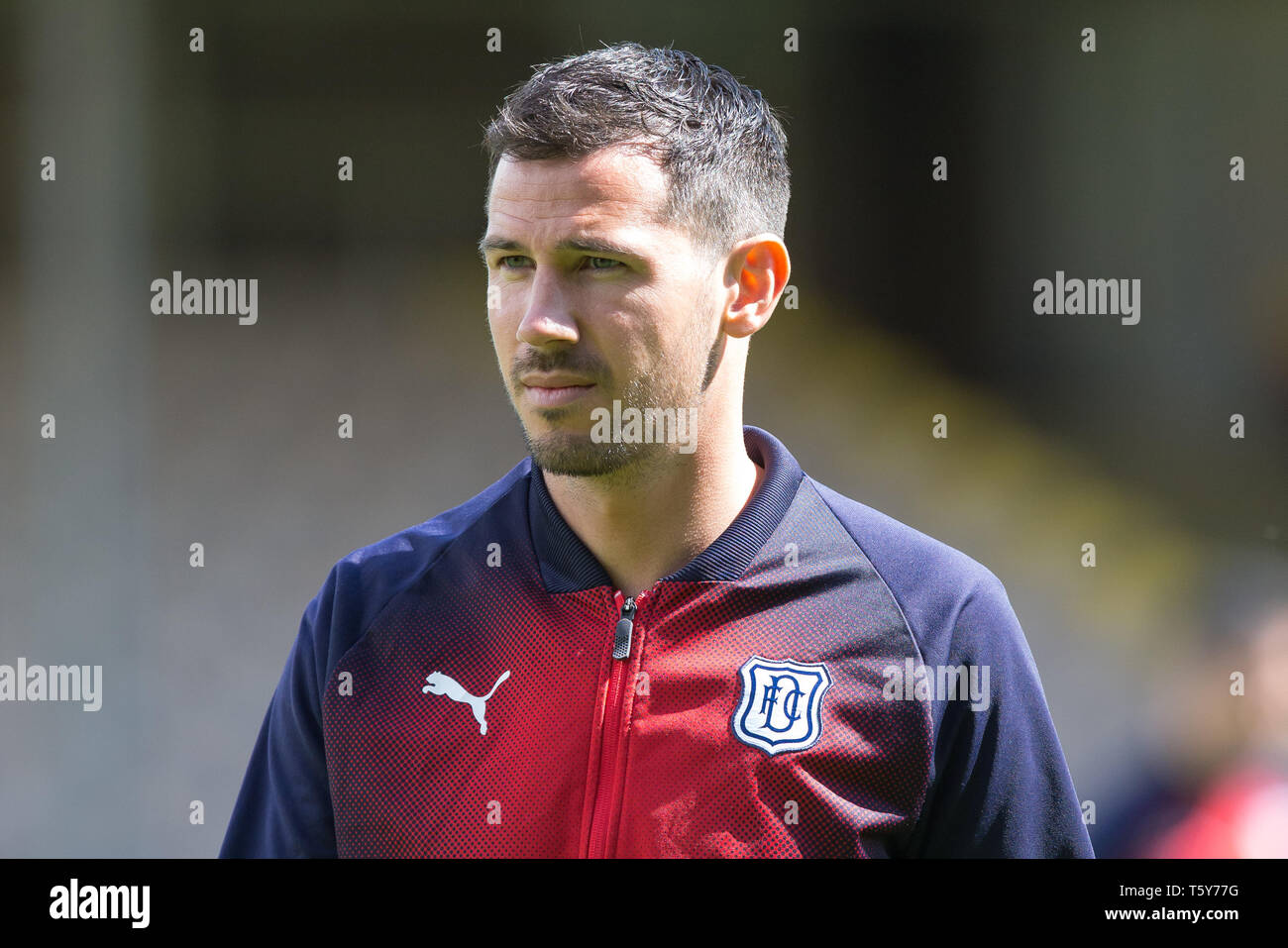 Fir Park, Motherwell, UK. 27th Apr, 2019. Ladbrokes Premiership football, Motherwell versus Dundee; Ryan McGowan of Dundee inspects the pitch before the match Credit: Action Plus Sports/Alamy Live News Stock Photo