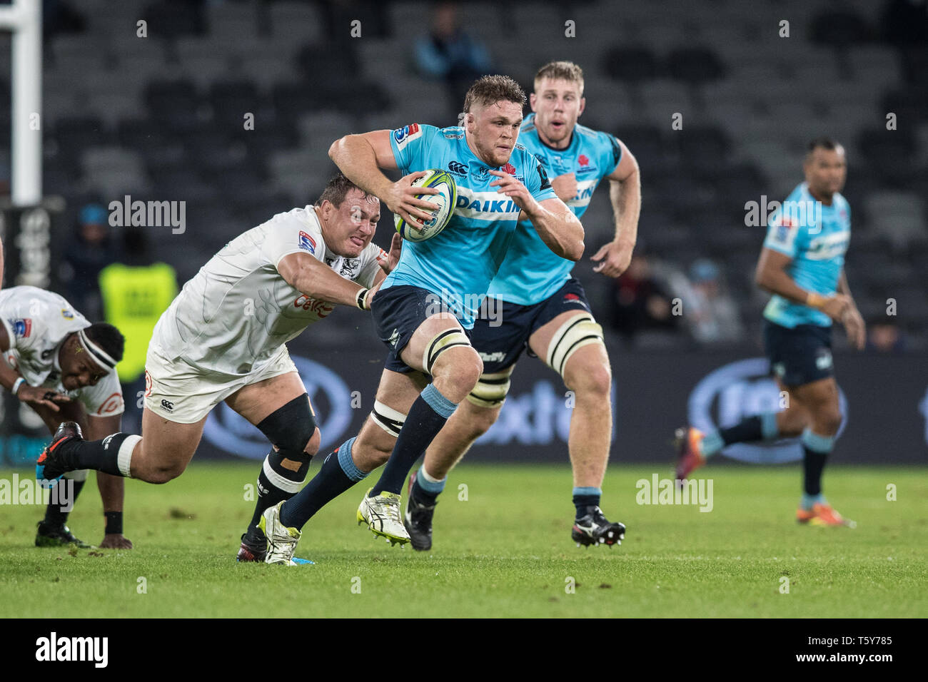 Sydney, Australia. 27th Apr, 2019. Rory O'Connor of Waratahs running the ball during the Super Rugby match between Waratahs and Sharks at Bankwest Stadium, Sydney, Australia on 27 April 2019. Photo by Peter Dovgan. Editorial use only, license required for commercial use. No use in betting, games or a single club/league/player publications. Credit: UK Sports Pics Ltd/Alamy Live News Stock Photo