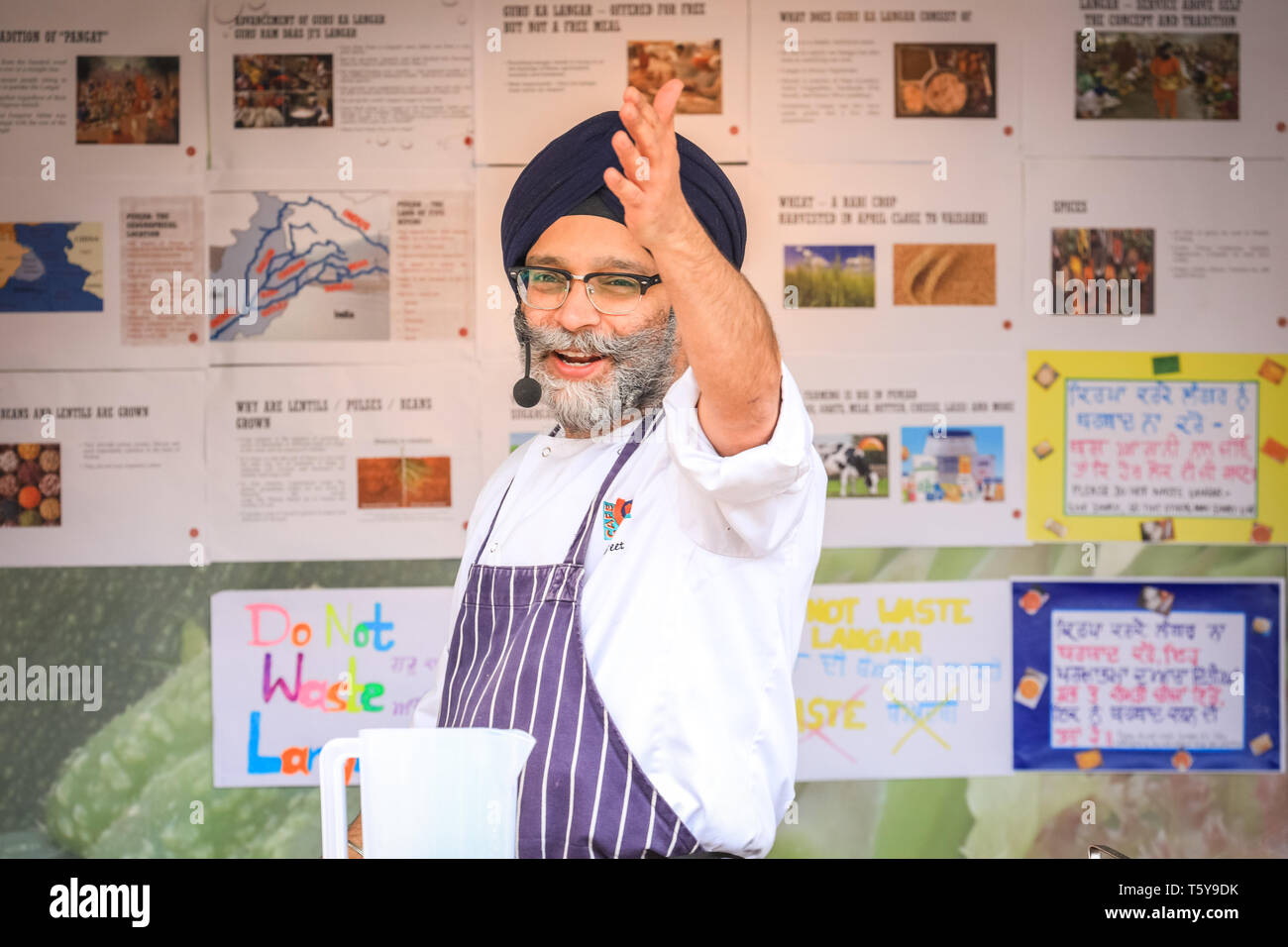 Trafalgar Square, London, UK, 27th April 2019. A Langar cooking demonstration. Vaisakhi Festival, a celebration of Sikh culture and heritage is once again brought back to Trafalgar Square. Highlights include colourful stage performances of kirtan and dharmic music, as well as food and cooking demonstrations. Credit: Imageplotter/Alamy Live News Stock Photo
