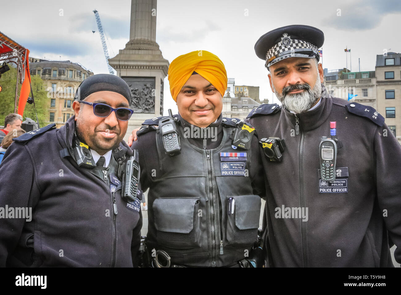 Trafalgar Square, London, UK, 27th April 2019. Sikh police officers and support officers join their colleagues in guarding the event. Vaisakhi Festival, a celebration of Sikh culture and heritage is once again brought back to Trafalgar Square. Highlights include colourful stage performances of kirtan and dharmic music, as well as food and cooking demonstrations. Credit: Imageplotter/Alamy Live News Stock Photo