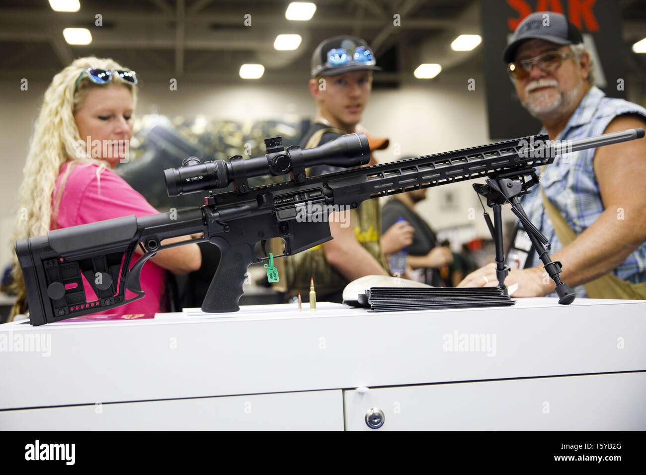 May 6, 2018 - Dallas, Texas, U.S. - Attendees look at the Windham Weaponry  Inc. .224 Valkyrie hunting rifle, which features a Luth-AR stock, during  the National Rifle Association (NRA) annual meeting