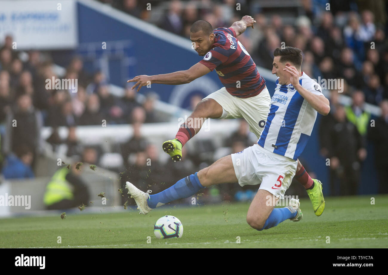 Brighton and Hove, England, UK 27th April 2019.  JosŽ Salom—n Rond—n (on loan from WBA) of Newcastle United shoots early in the second half only to be blocked by Lewis Dunk of Brighton and Hove Albion during the Premier League match between Brighton and Hove Albion and Newcastle United at the American Express Community Stadium, Brighton and Hove, England on 27 April 2019. Photo by Steve Ball.  Editorial use only, license required for commercial use. No use in betting, games or a single club/league/player publications. Credit: UK Sports Pics Ltd/Alamy Live News Stock Photo