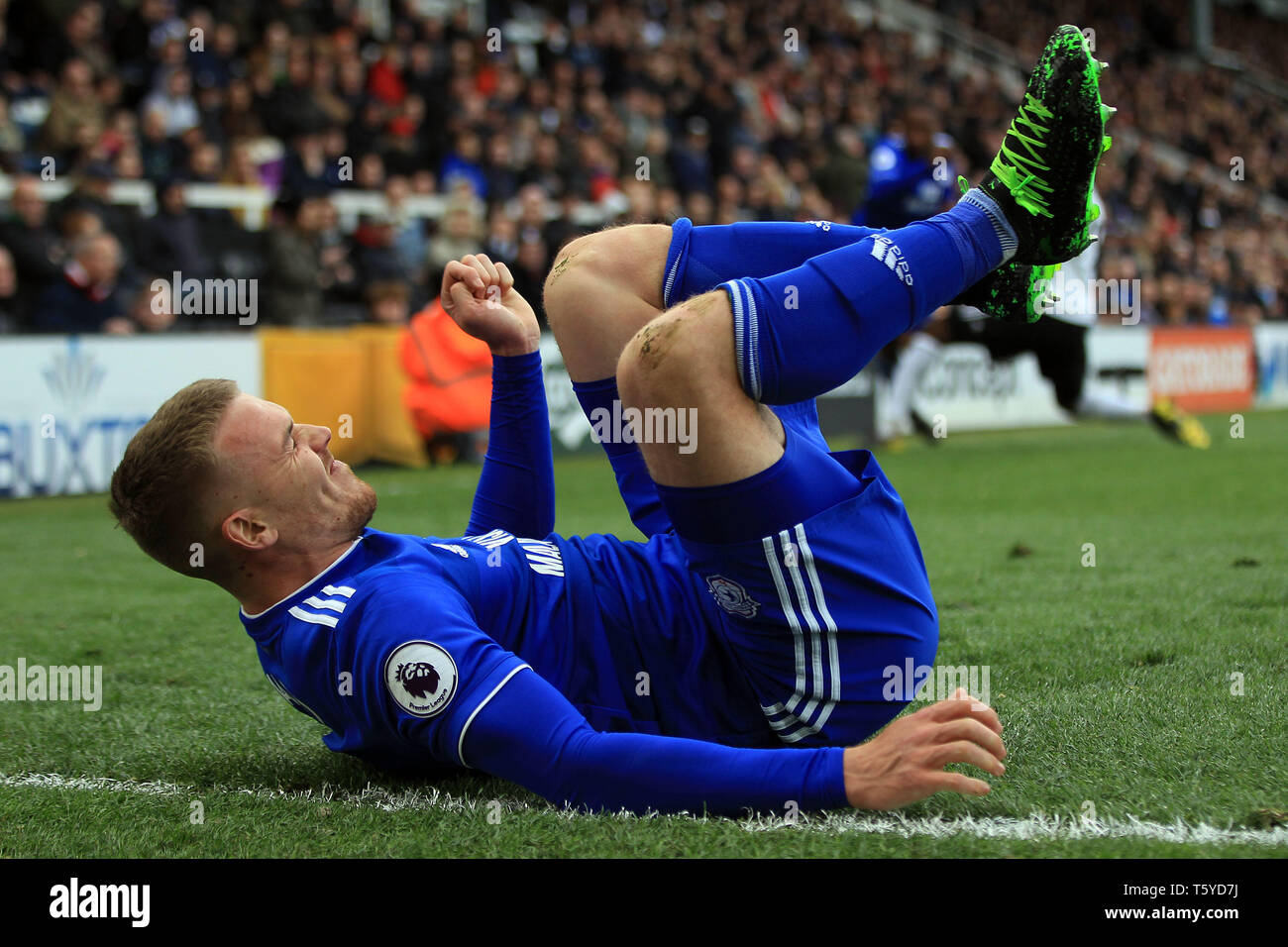 Craven Cottage, London, UK. 27th April 2019. Danny Ward of Cardiff City lies on the turf after being fouled by Calum Chambers of Fulham. Premier League match, Fulham v Cardiff City at Craven Cottage in London on Saturday 27th April 2019.  this image may only be used for Editorial purposes. Editorial use only, license required for commercial use. No use in betting, games or a single club/league/player publications. pic by Steffan Bowen/Andrew Orchard sports photography/Alamy Live news Credit: Andrew Orchard sports photography/Alamy Live News Stock Photo