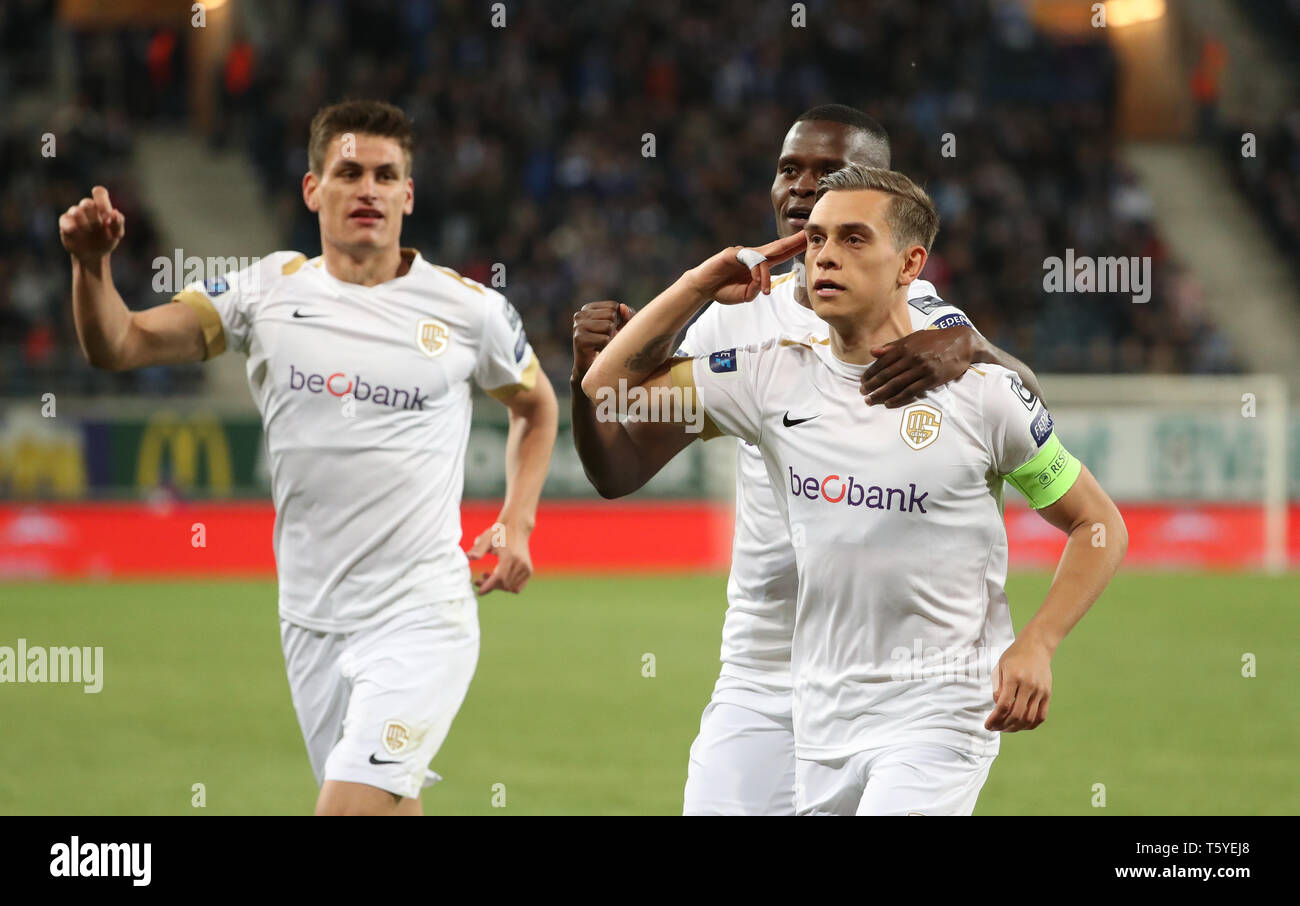 GENT, BELGIUM - APRIL 27: Leandro Trossard of Genk celebrates with Ally  Samatta of Genk after scoring a goal during the Jupiler Pro League play-off  1 match (day 6) between Kaa Gent