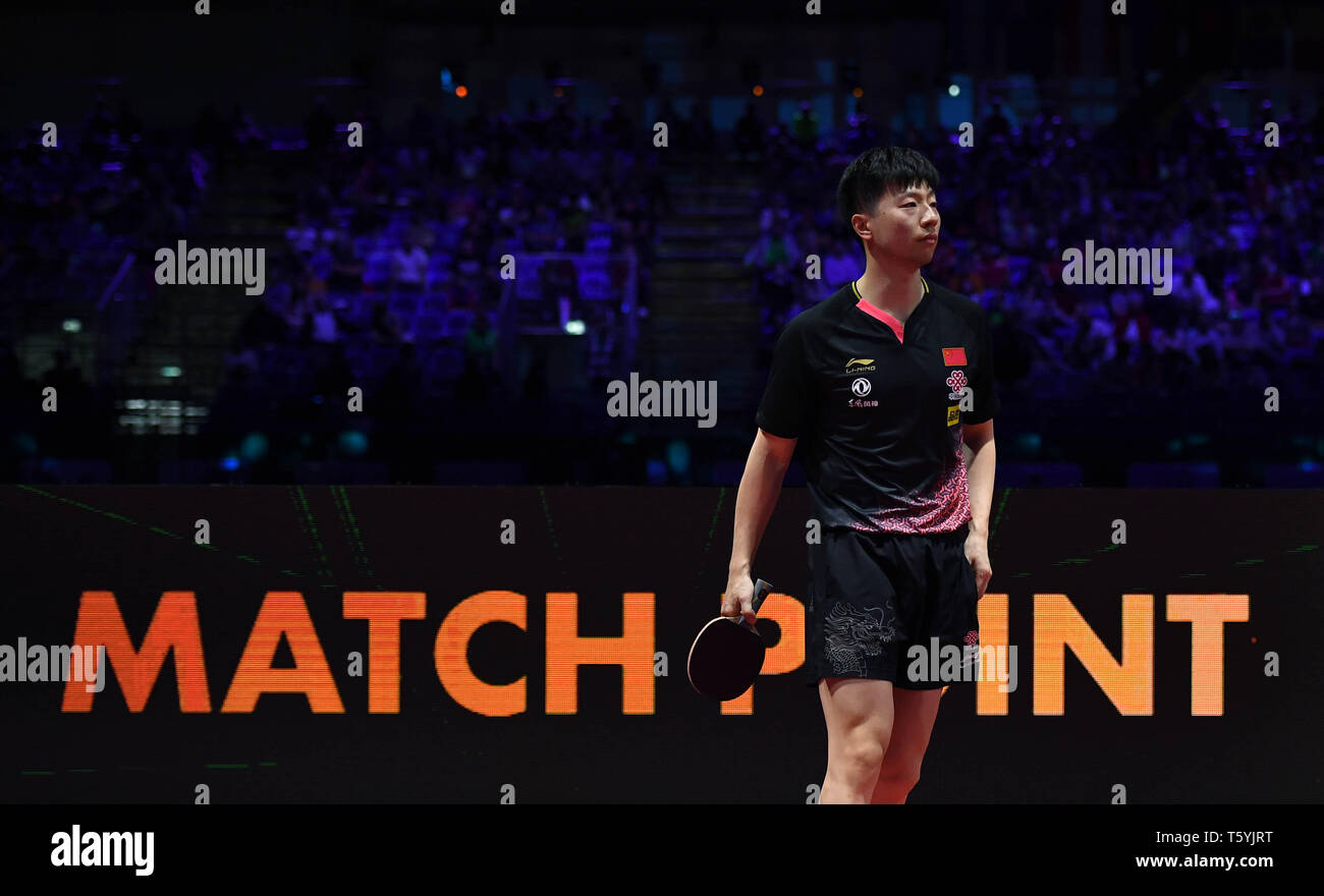 Budapest. 27th Apr, 2019. Ma Long of China reacts during the men's singles semifinal with his teammate Liang Jingkun at 2019 ITTF World Table Tennis Championships in Budapest, Hungary on April 27, 2019. Credit: Tao Xiyi/Xinhua/Alamy Live News Stock Photo