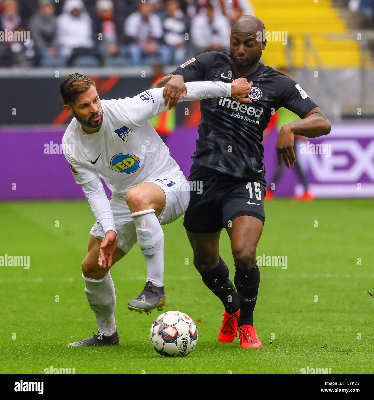 Frankfurt, Germany. 27th Apr, 2019. Marvin Plattenhardt (L) of Berlin vies with Jetro Willems of Frankfurt during the Bundesliga match between Eintracht Frankfurt and Hertha Berlin in Frankfurt, Germany, April 27, 2019. The match ended in a 0-0 draw. Credit: Ulrich Hufnagel/Xinhua/Alamy Live News Stock Photo