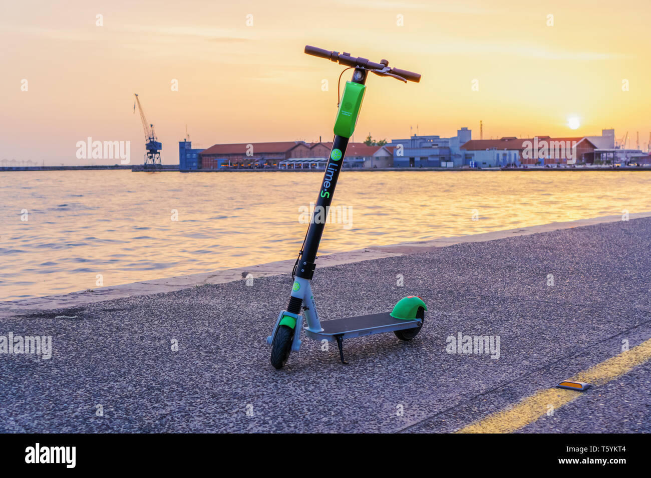 Parked green & black ride sharing Lime-S electric Scooter rental without  passenger, ready to be used by the next rider at Thessaloniki, Greece Stock  Photo - Alamy