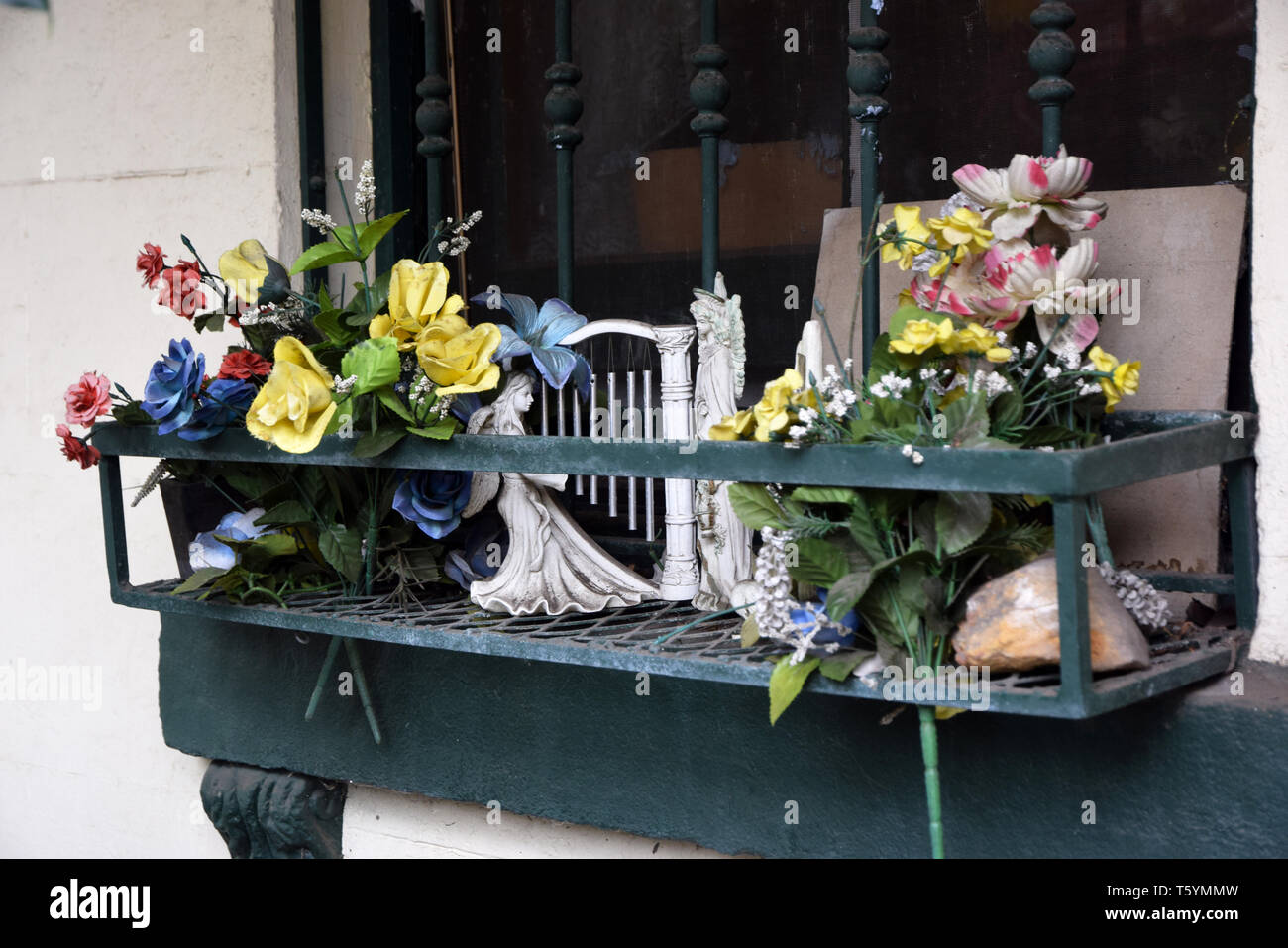 window box with plastic flowers on front porch, newtown, sydney, australia Stock Photo