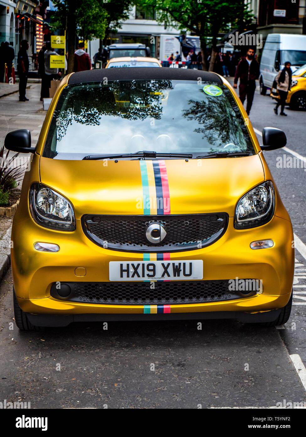 miwhip a London based ride hailing app with the twist of offering occasional gold painted supercars in place of normal hire cars Stock Photo