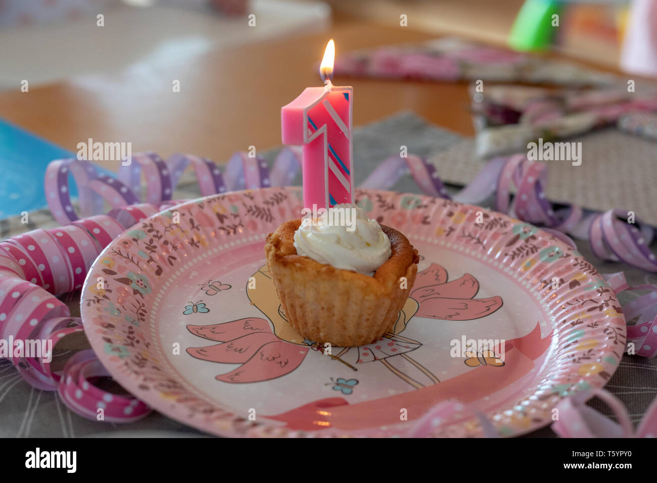 Number 1 birthday candle in a cupcake Stock Photo