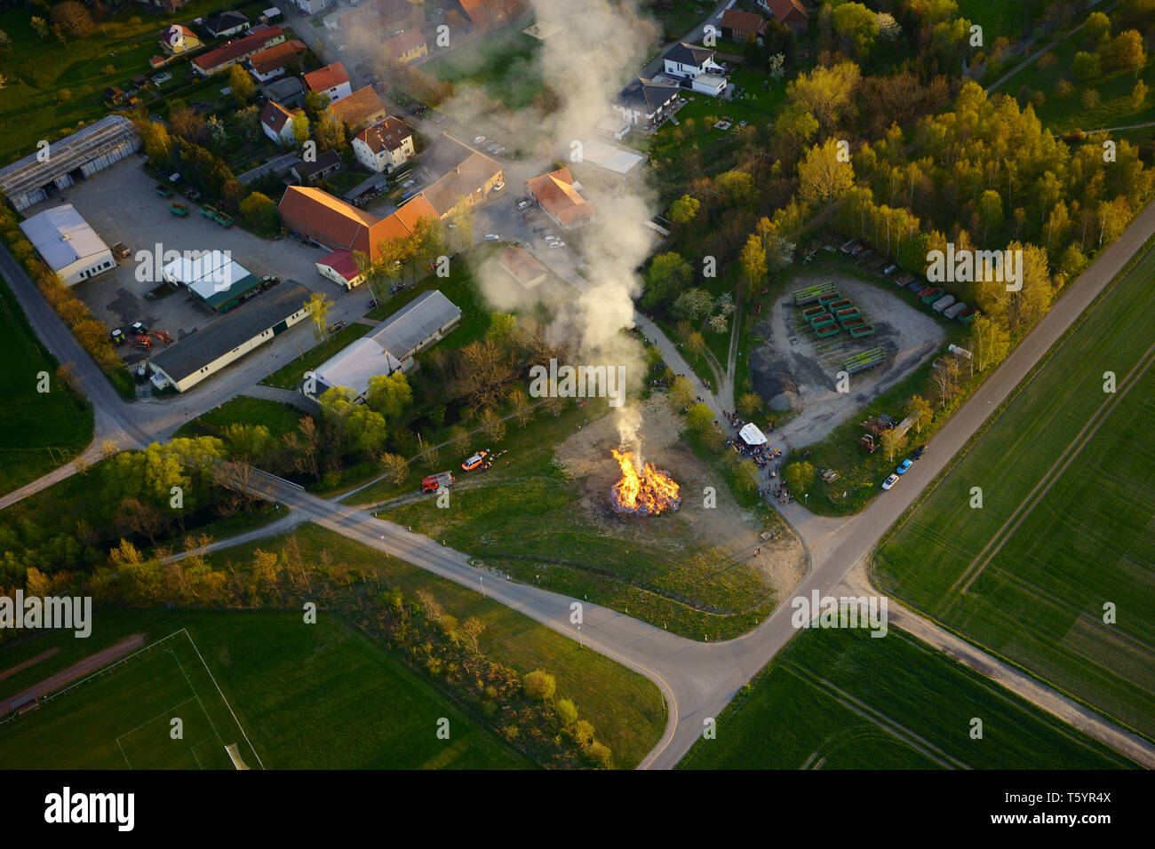 Aerial view of Easter Fire. Easter bonfire celebration around sunset on Holy Saturday in the district of Harz in Saxony-Anhalt, Germany. Stock Photo