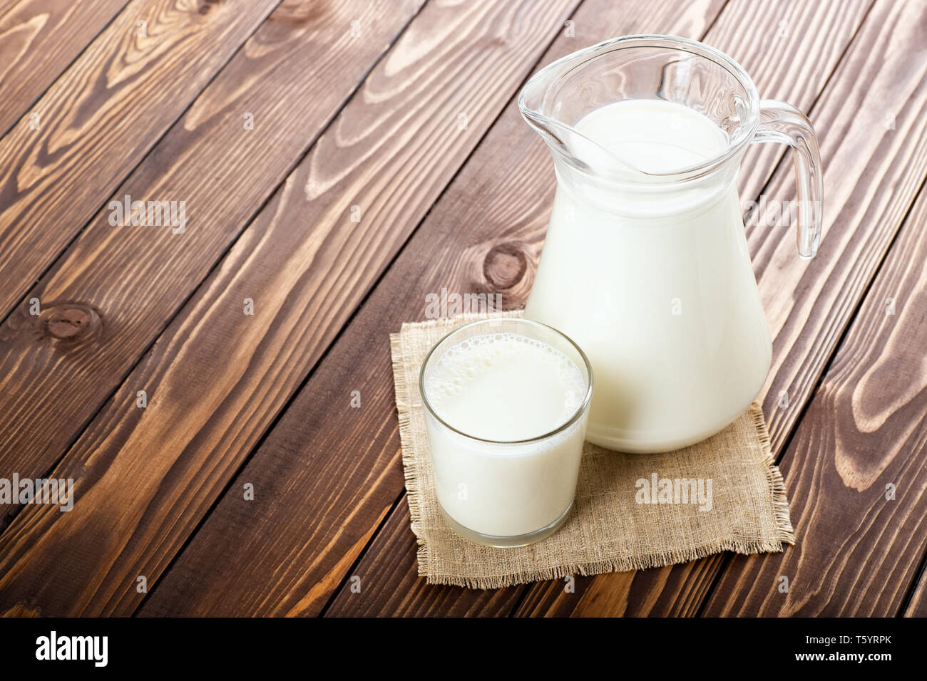 milk in glass and jug Stock Photo