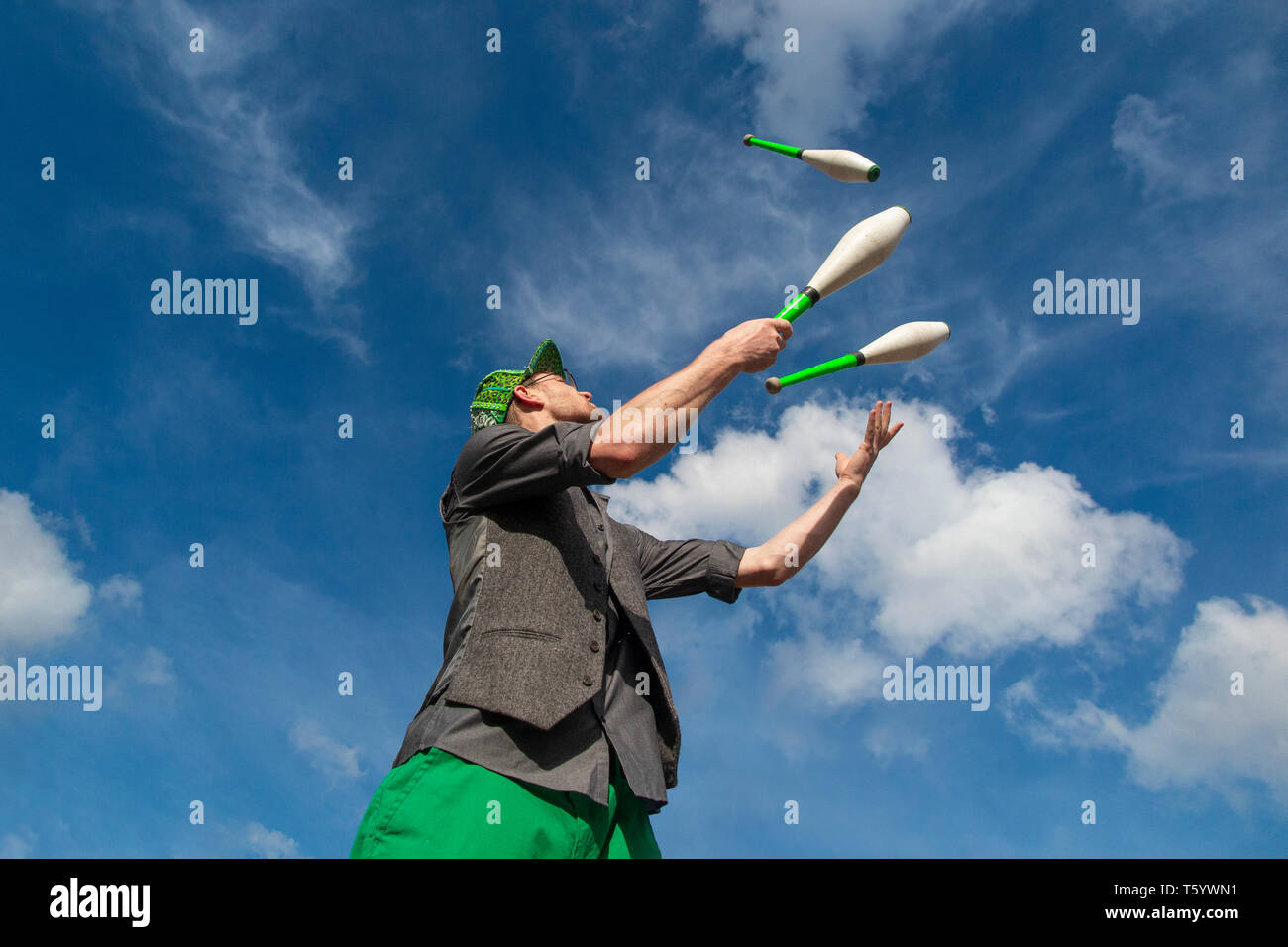 A skilled juggler at the Closing Ceremony of the Extinction Rebellion demonstration on April 25th 2019 at Speaker's Corner, Marble Arch, London Stock Photo