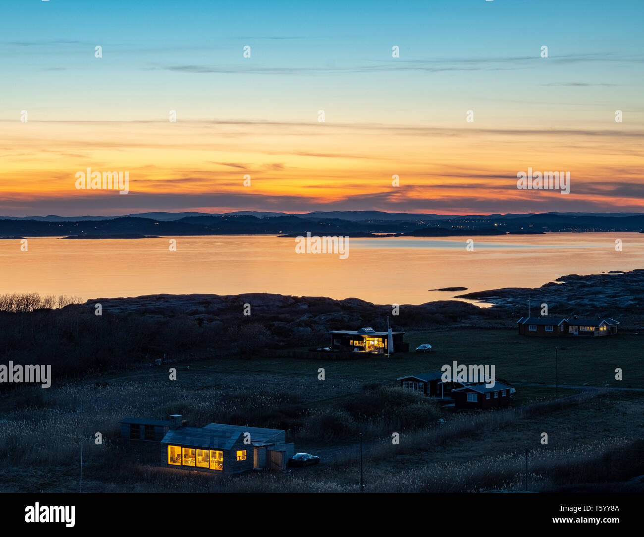 Cottages at the Oslo fjord coastline, at 'the end of the world' in Norway Stock Photo