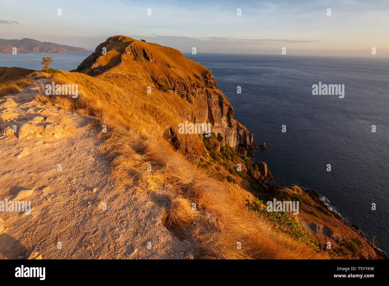 Sunset from hilltop in mountains in Komodo national park Stock Photo
