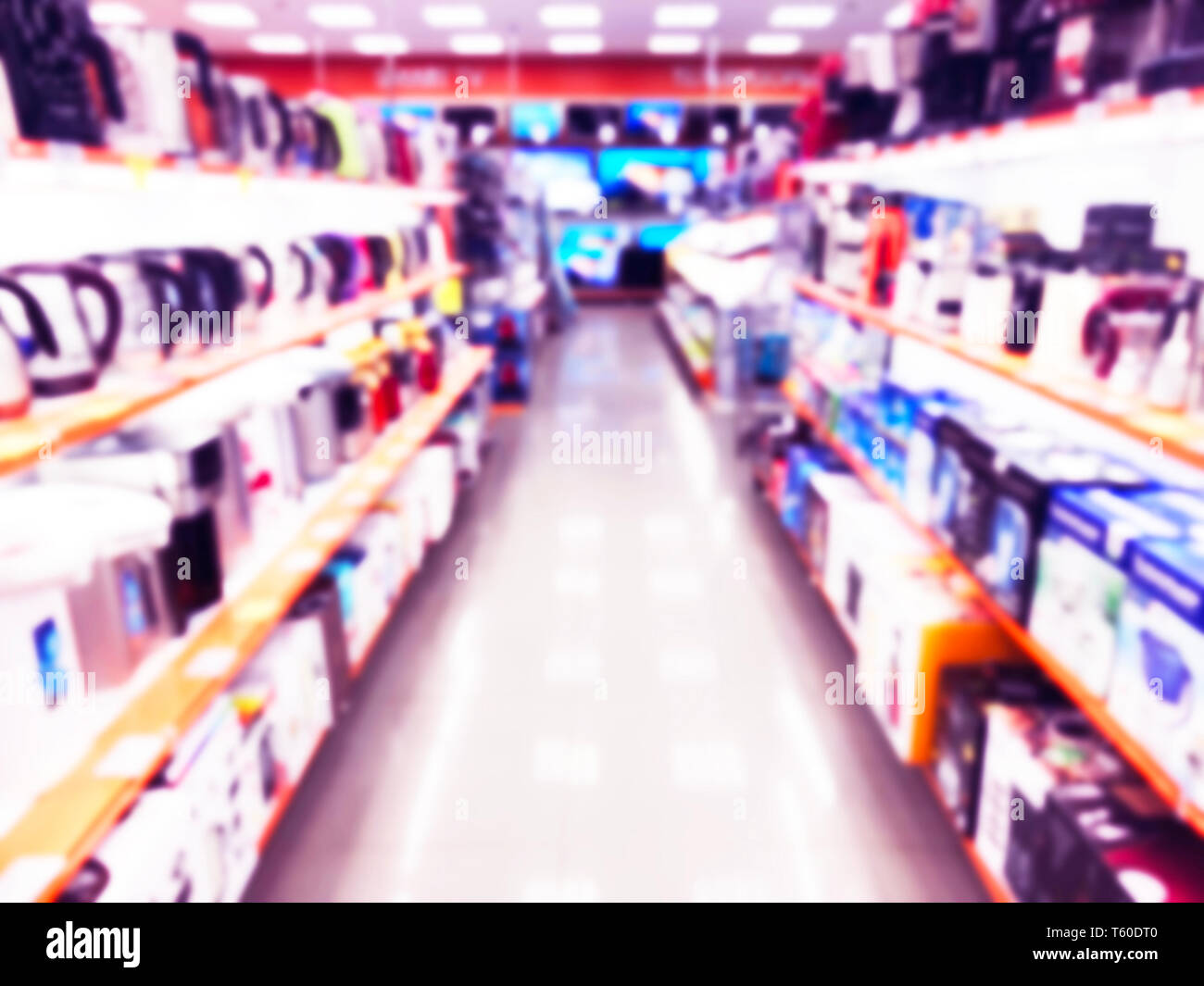 Abstract blur background with mobile store boutique in shopping mall. Eletronic department store interior with bokeh light blurred background. Defocus Stock Photo