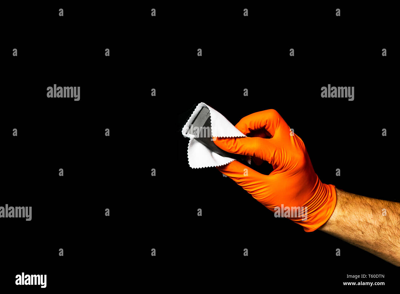 Car polish wax worker hands polishing car. Buffing and polishing