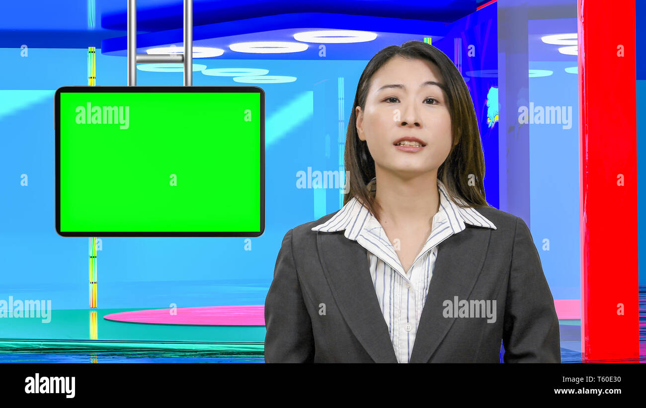 Female Asian American News anchorwoman in virtual TV studio with green screen suspended display, original design elements Stock Photo