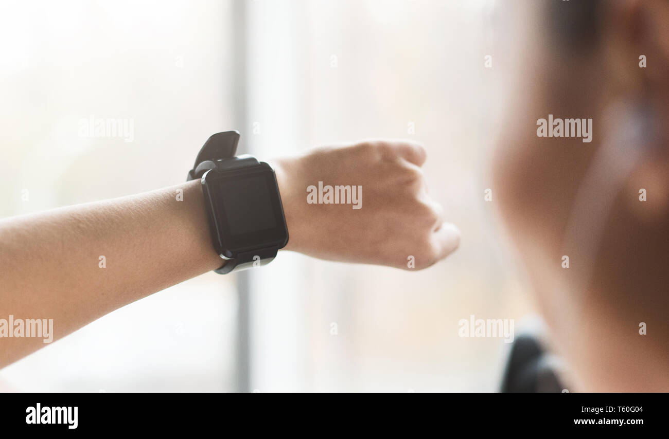 Girl using sport smart watch, doing cardio exercise Stock Photo Alamy