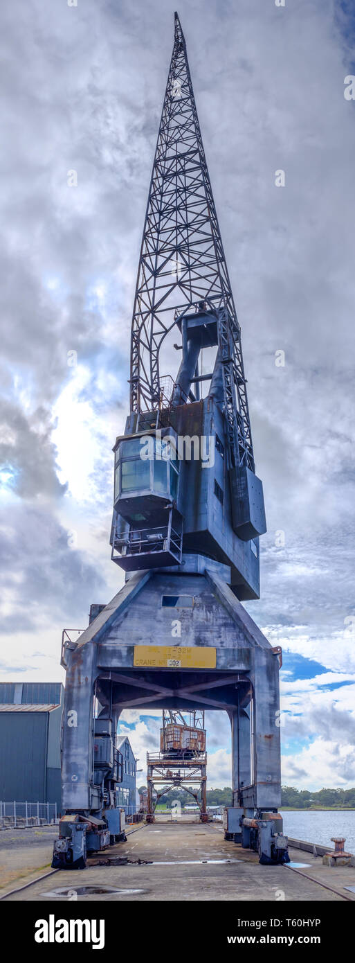 Cockatoo island Sydney, Australia, large industrial ship building crane on dock of historical maritime ship yard Stock Photo