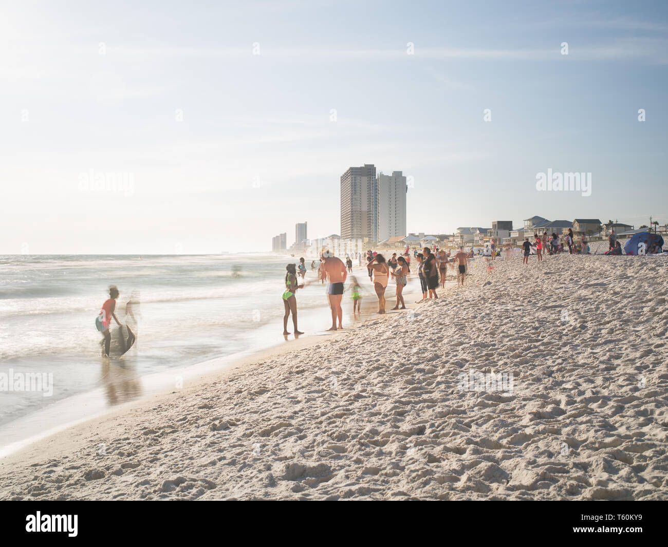 People walking on Panama City Beach. Stock Photo