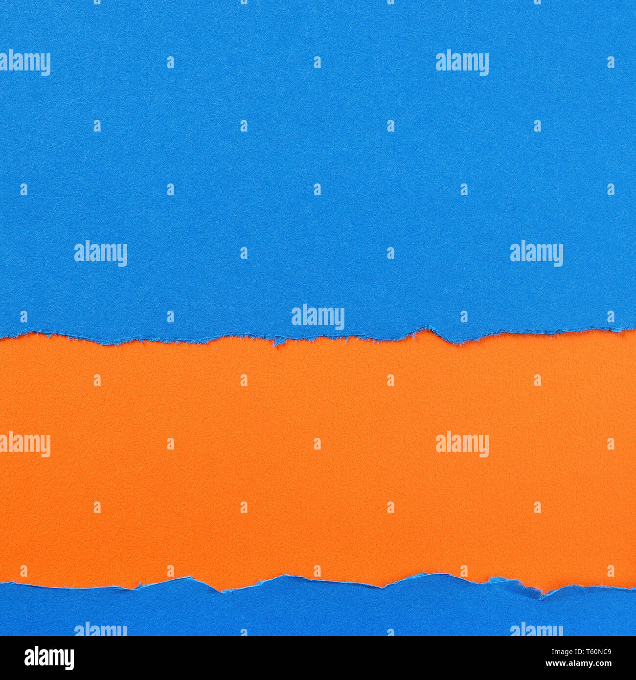 Torn blue paper strip orange background border frame Stock Photo
