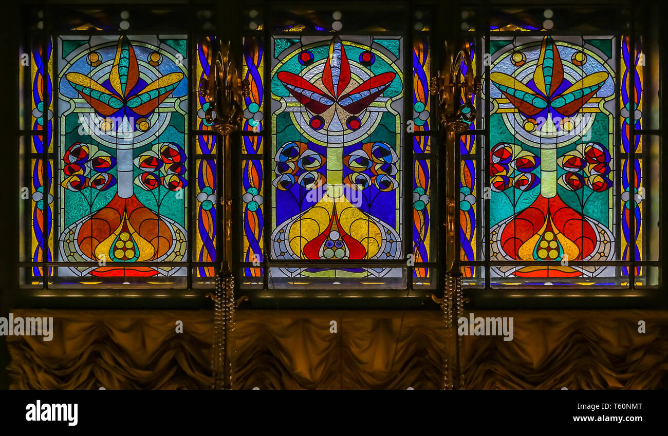 Ornate stained glass windows in a historic famous grocery store