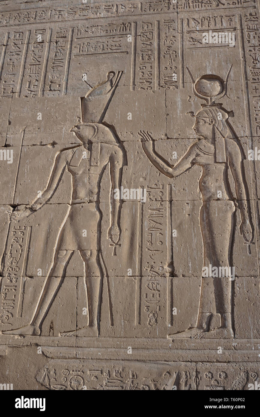 Edfu, Egypt: Detail of carvings on the first pylon of the temple of ...