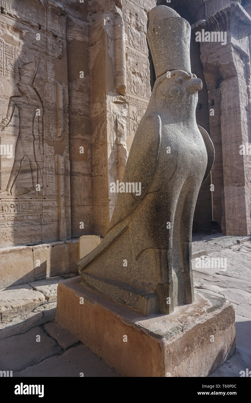 Edfu, Egypt: Statue of Horus at the temple of Edfu, the the largest temple dedicated to Horus and Hathor of Dendera. Stock Photo