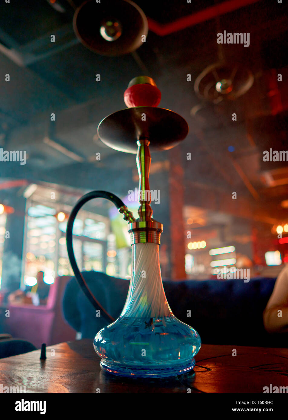 hookah in the smoke is on the table Stock Photo