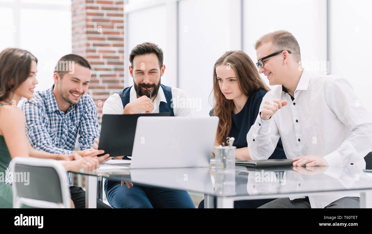 business team discusses new ideas sitting at the office Desk. office