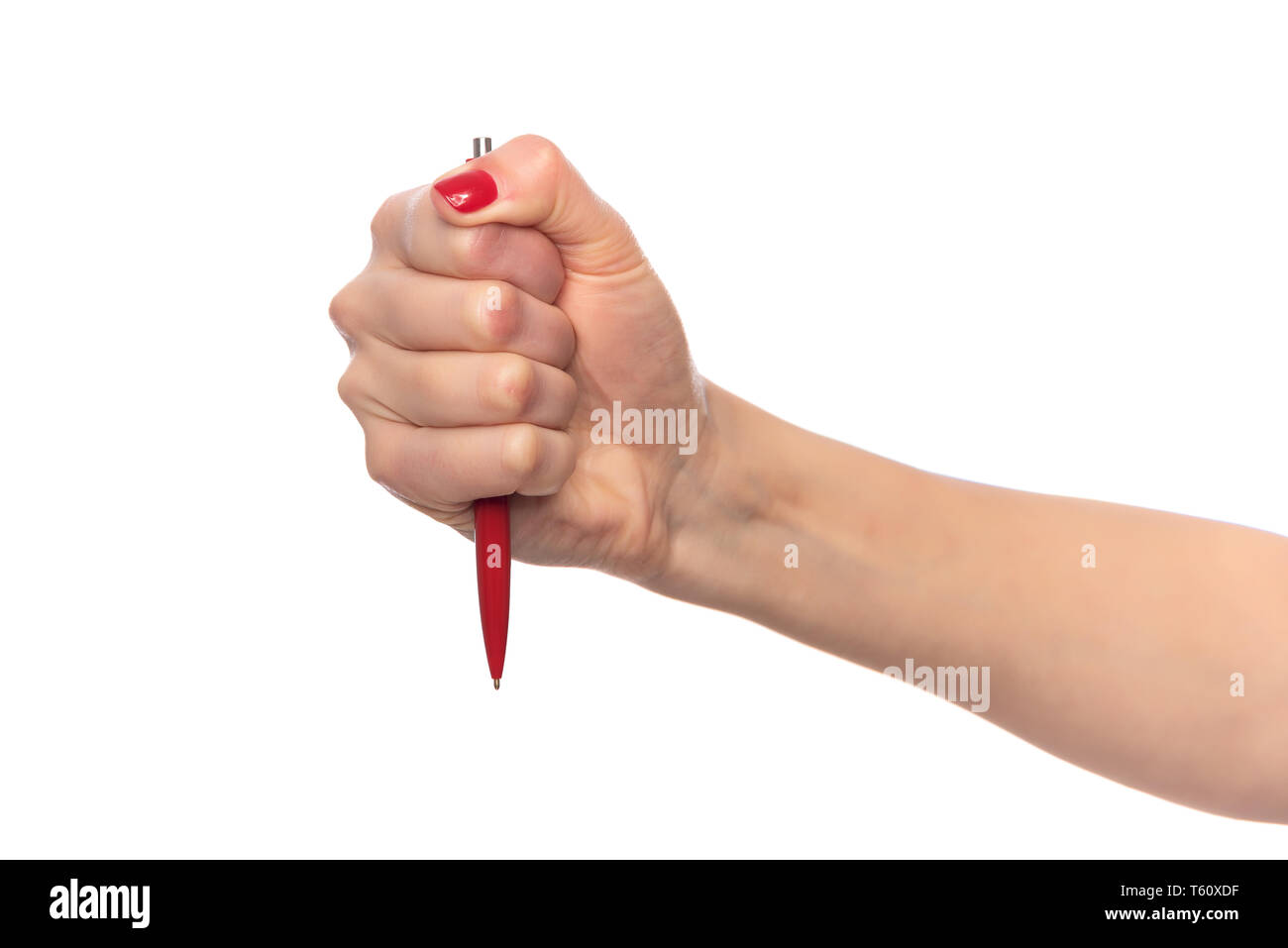 Female hand holding a pen on white background. Stock Photo