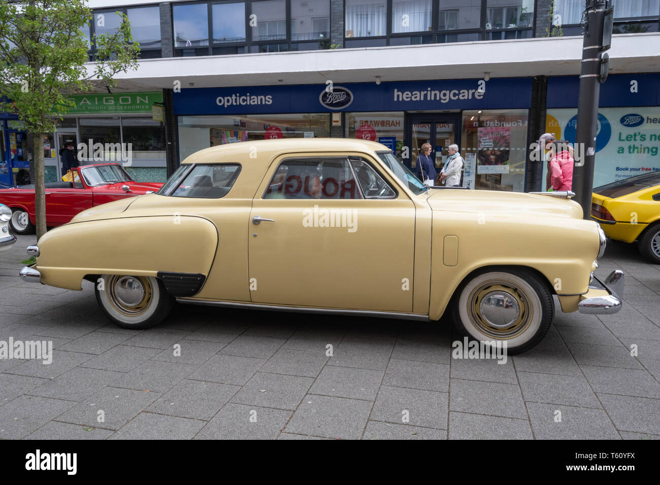 Yellow 1949 Studebaker Champion, an American vintage car at a classic motor vehicle show in the UK Stock Photo