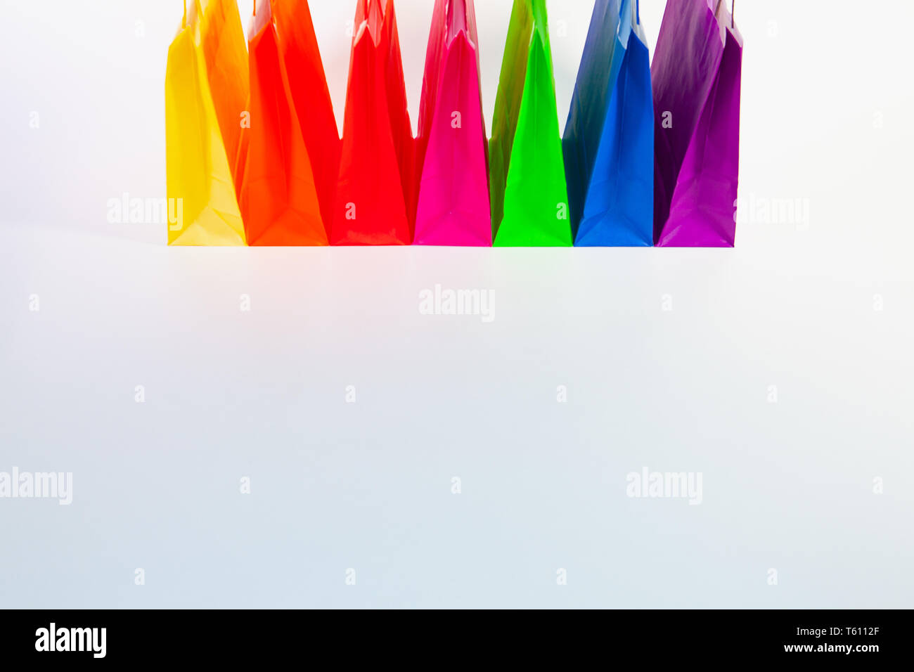 Set of colorful empty shopping bags isolated on the white background ...