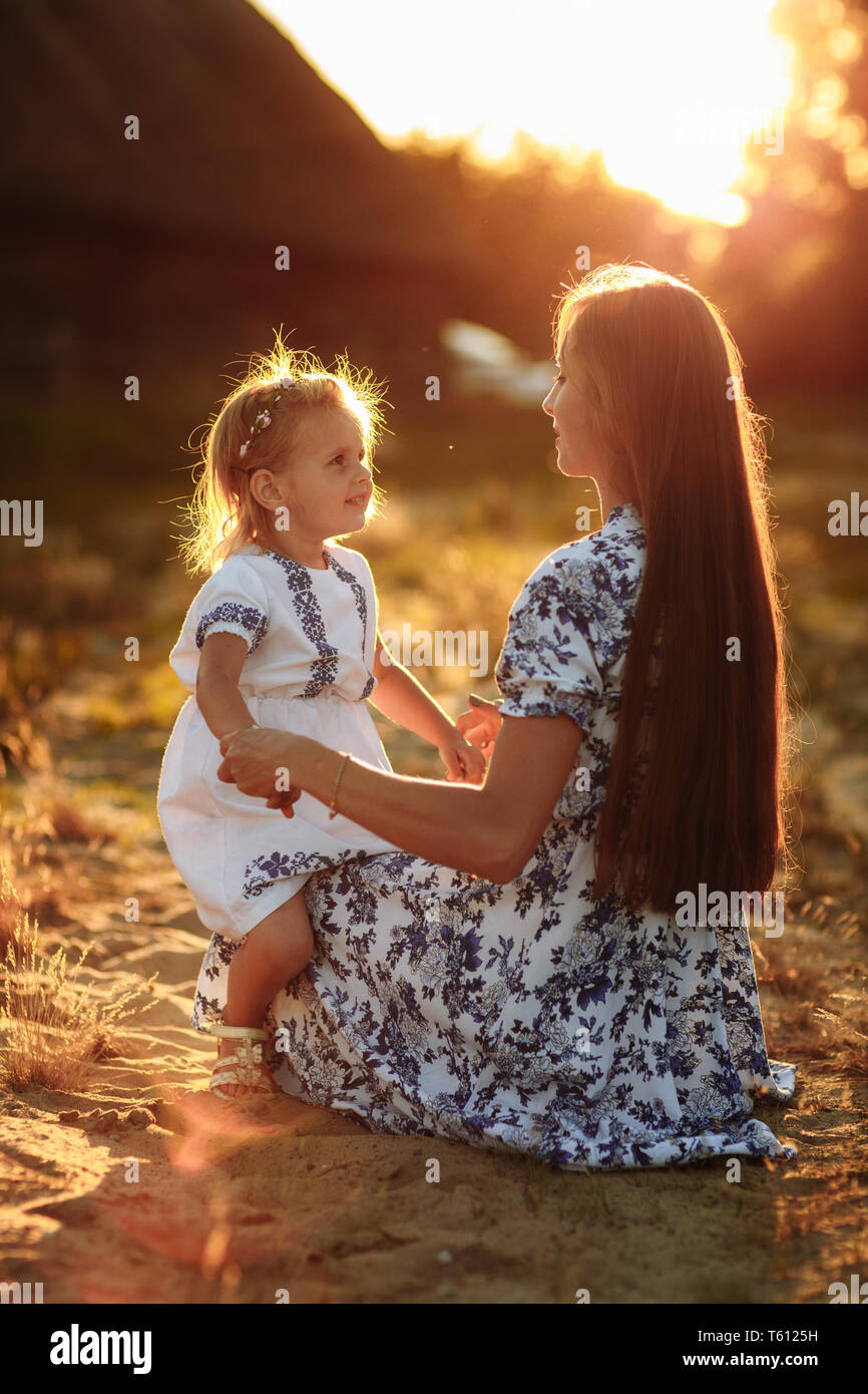 Mother daughter time. Portrait of mother and daughter at nature ...