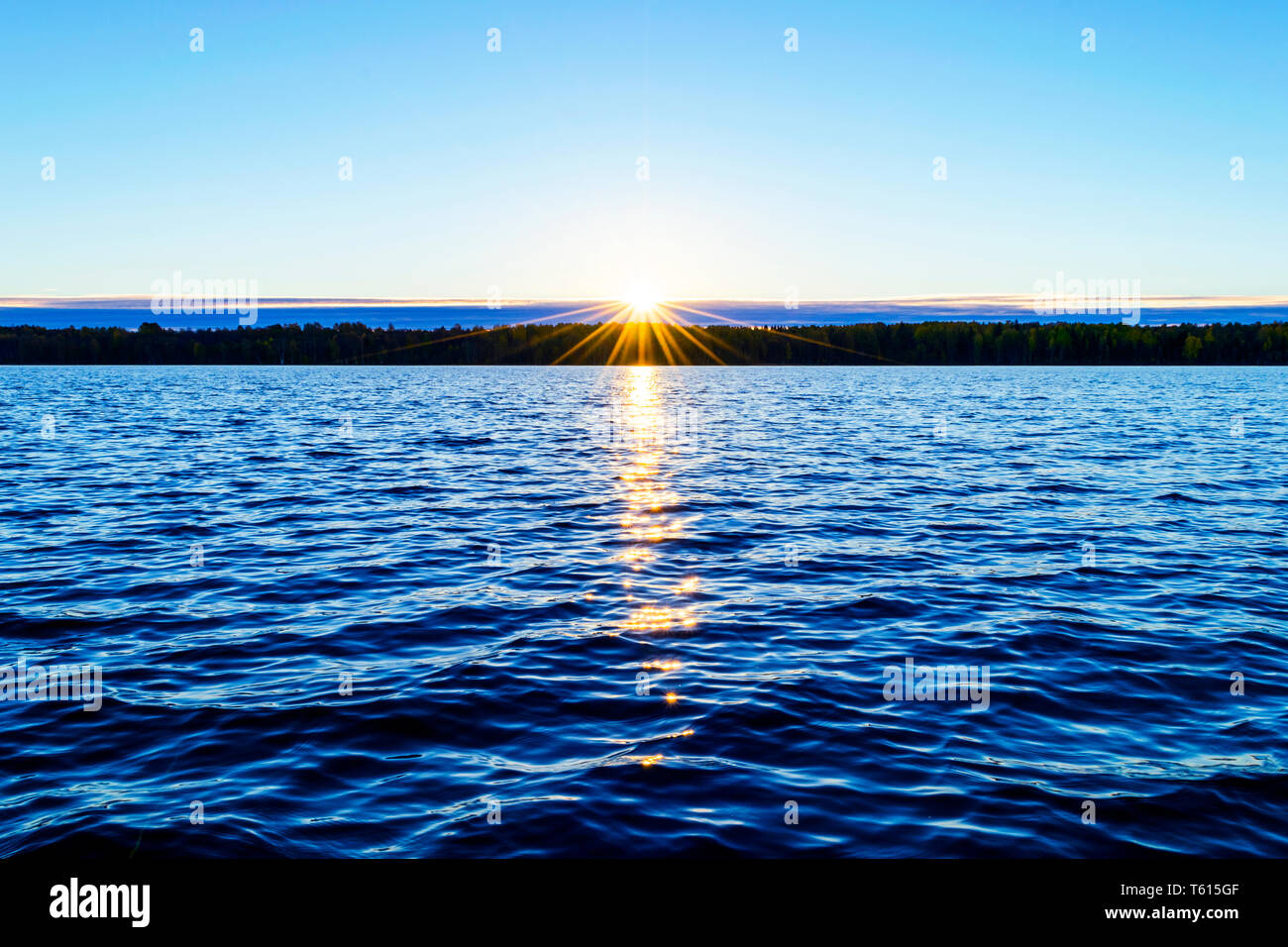 Water surface. View of a Sunset sky background. Dramatic gold sunset sky  with evening sky clouds over the sea. View of a Crystal clear sea water  textu Stock Photo - Alamy, image size:1300x956
