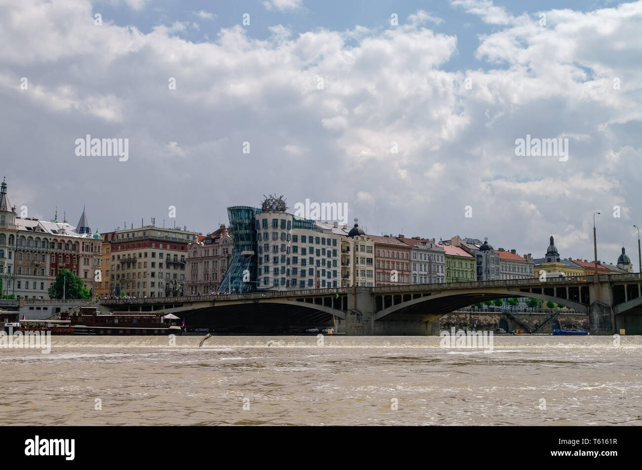 Prague, Czech Republic - May 8, 2012: View to famous Dancing House in Prague from River Vltava, Czech Republic Stock Photo
